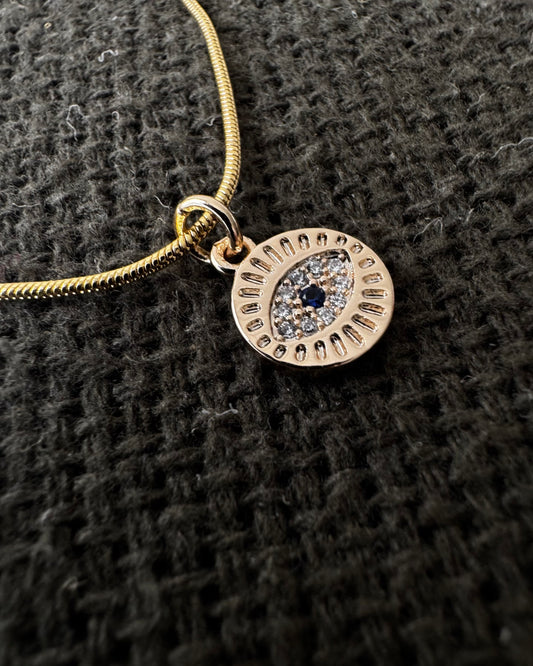 Charm Olho Grego Dourado